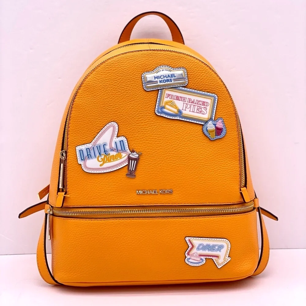 Michael Kors Vibrant Orange Backpack with Fun Patches